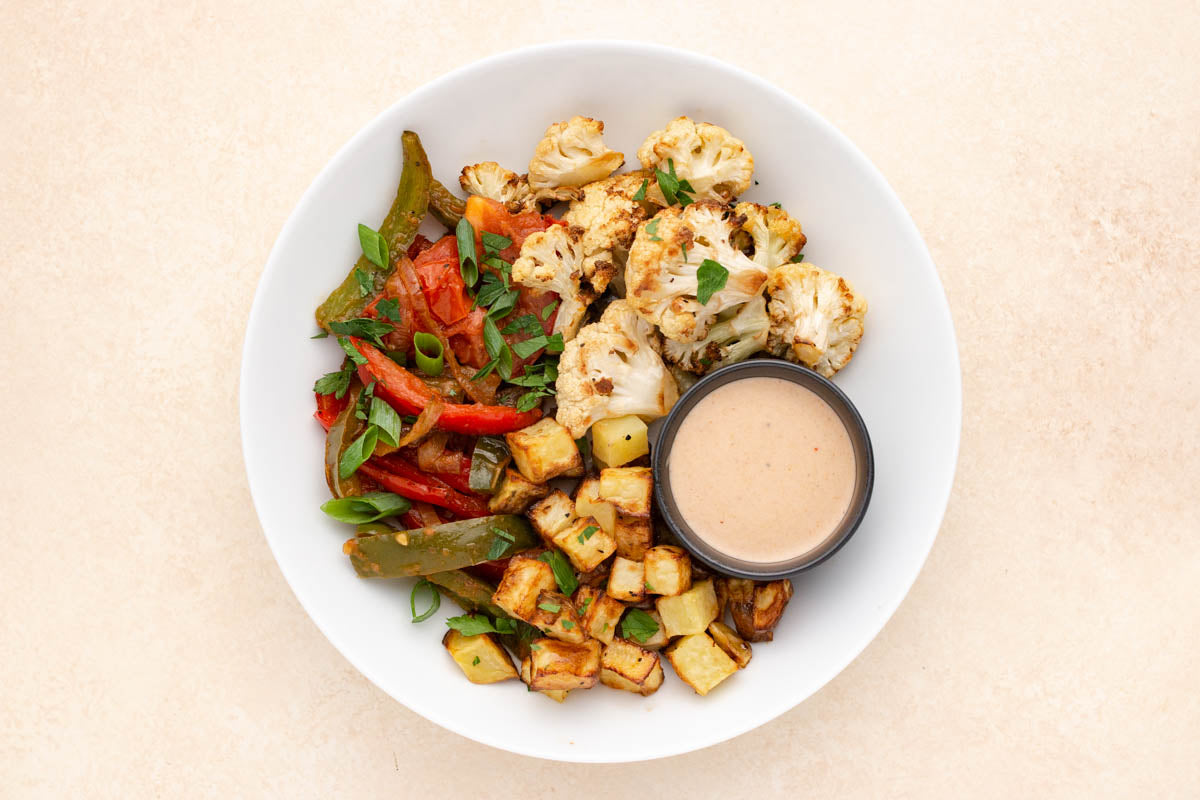 Peruvian Cauliflower Stir Fry with Peruvian Style Roasted Chicken Thig ...